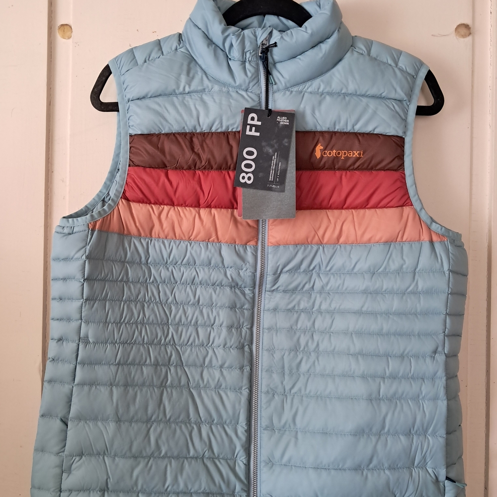 cotopaxi Women's Light Blue Quilted Down Vest with Multi-Color Chest Stripes